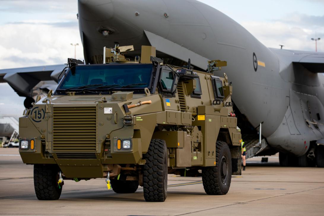 A Bushmaster protected mobility vehicle bound for Ukraine waits to be loaded onto a Royal Australian Air Force C-17A Globemaster III aircraft.