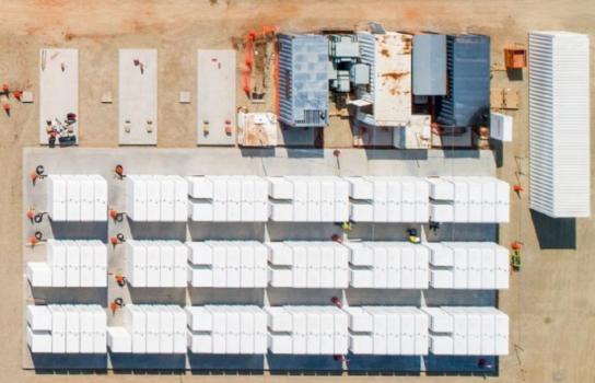 Aerial image of a grid of steel battery containers as part of the WA long duration battery under construction.